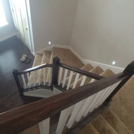 Banisters down curved stairs